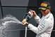 Hamilton celebrates at Silverstone.