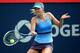 Maria Sharapova hits a forehand during Rogers Cup match.