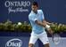 Novak Djokovic prepares to hit a backhand during a match at the 2014 Rogers Cup in Toronto.