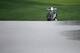 Early starters saw greens get flooded quickly in heavy rains.