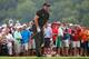 Phil Mickelson looks anxiously after a chip shot at the PGA Championship.