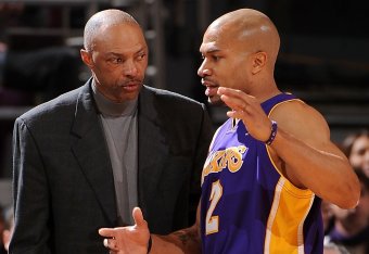 Jim Cleamons and Derek Fisher, here with the Lakers in 2010, are now reunited on the East Coast.