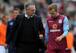 STOKE ON TRENT, ENGLAND - AUGUST 16: Aston Villa manager Paul Lambert speaks with Andreas Weimann as they leave the field at half-time during the Barclays Premier League match between Stoke City and Aston Villa on August 16, 2014 in Stoke on Trent, Englan
