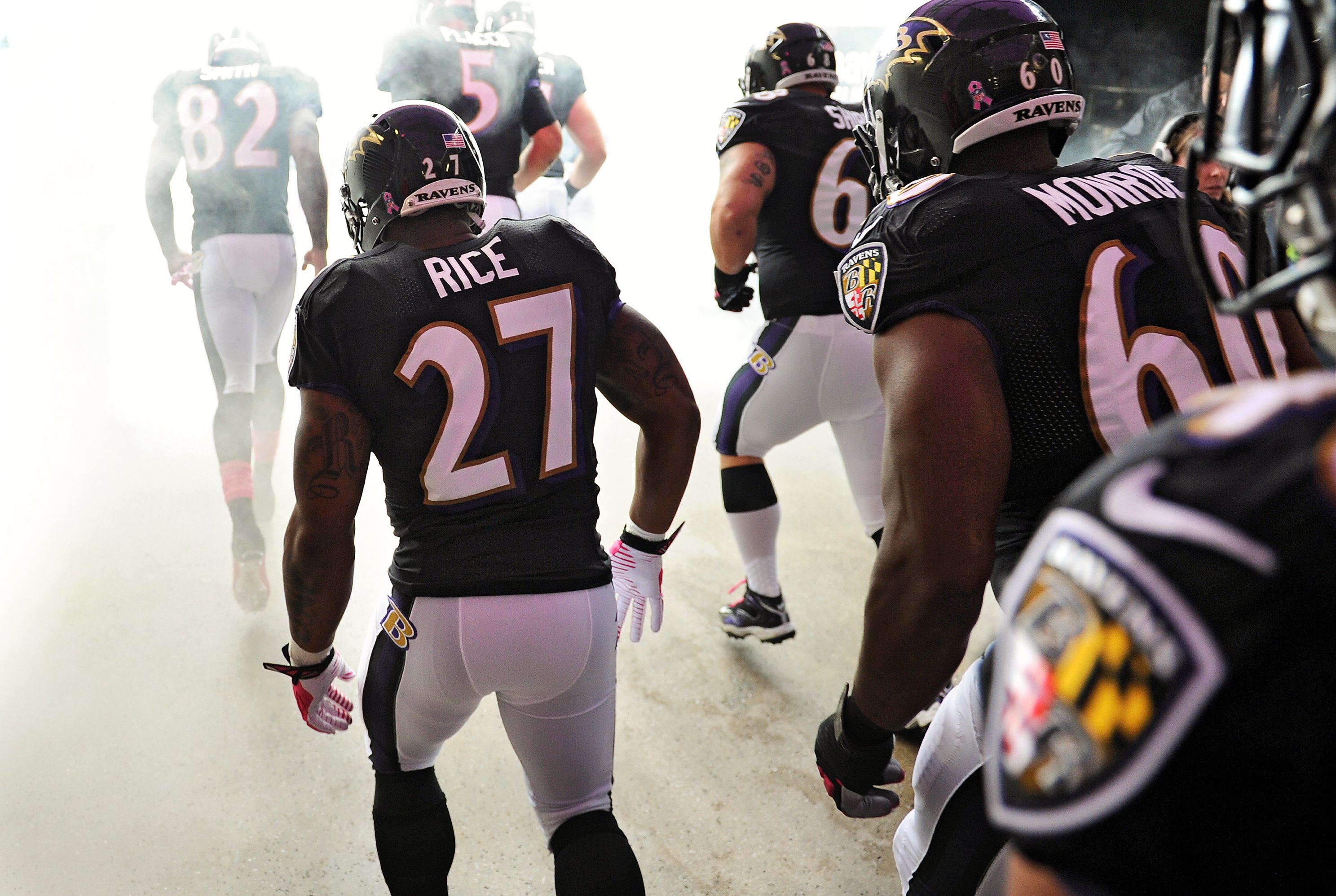 Baltimore Ravens cornerback Cary Williams, right, knocks the ball