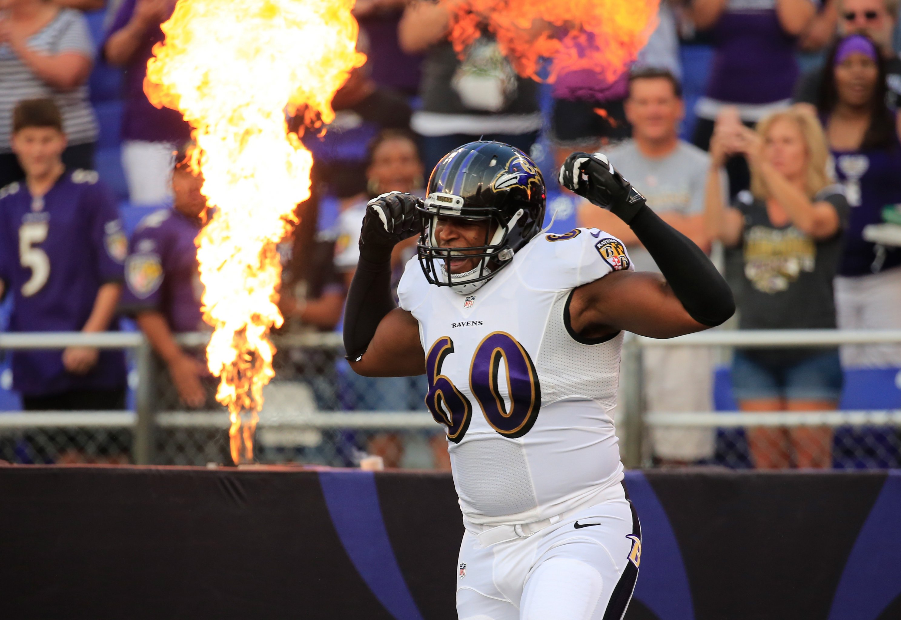 Baltimore Ravens cornerback Cary Williams, right, knocks the ball