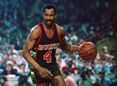 Sidney Moncrief of the Milwaukee Bucks shoots over George Johnson of News  Photo - Getty Images