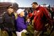 LSU head coach Les Miles (left) and Arkansas head coach Bret Bielema (right) embrace after the Tigers' 31-27 victory last season.