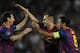 Lionel Messi, Andres Iniesta and Xavi Hernandez.