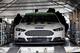 Brad Keselowski's Ford Fusion goes through inspection.