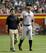 Brandon Belt exits the game with the Giants trainer.