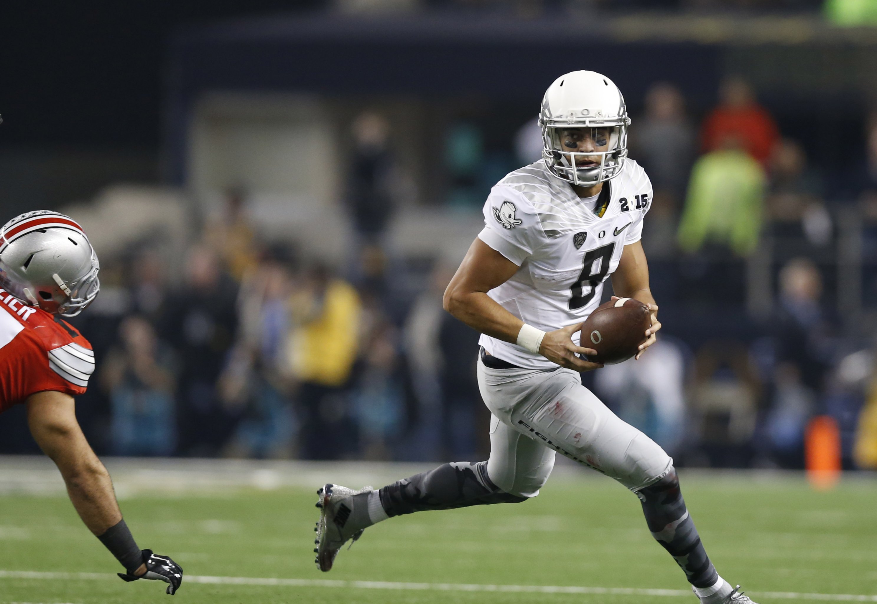 Oregon's Marcus Mariota, Hroniss Grasu announce they will return