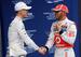 Michael Schumacher and Lewis Hamilton at the 2012 Chinese Grand Prix.