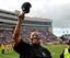 ECU coach Ruffin McNeill celebrates last season's upset win over the Hokies.