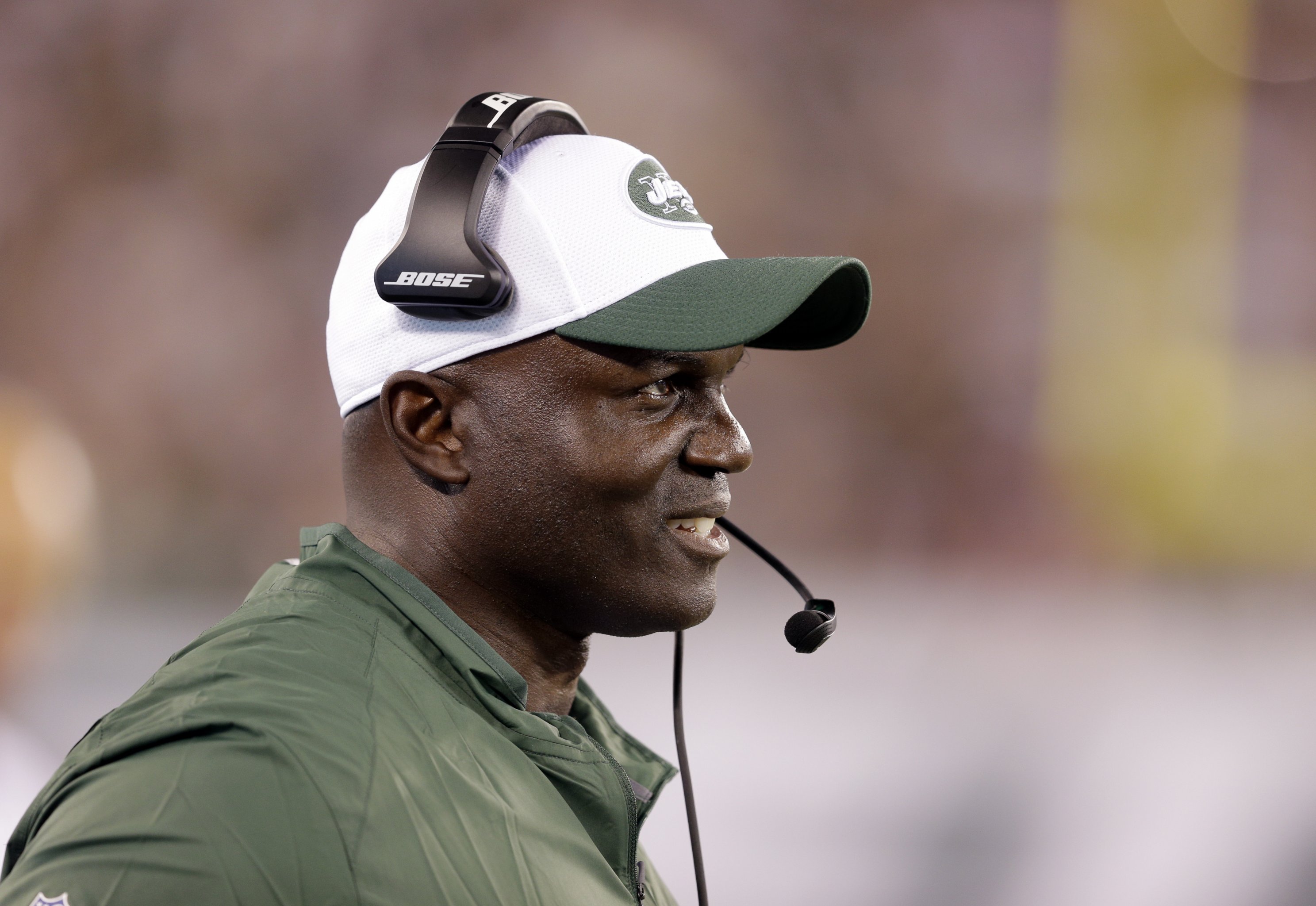 New York Jets head coach Todd Bowles and coaching staff stand on the  sidelines in the 4th quarter against the New England Patriots at MetLife  Stadium in East Rutherford, New Jersey on