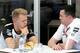 Eric Boullier with Kevin Magnussen.