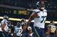 Michael Bennett turned in a superb performance against St. Louis, but couldn't escape questions about Kam Chancellor.
