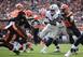 RB Latavius Murray takes a carry between Browns defenders.