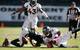 Raiders wide receiver Seth Roberts fails to reel in a pass against the Denver Broncos