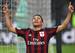 Carlos Bacca doubled AC Milan's lead with a poacher's finish.