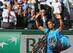 Rafael Nadal waves to fans after his quarterfinals loss at the 2015 French Open.
