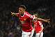 Martial celebrates a goal against Swansea.