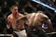 Robert Whittaker, left, and Uriah Hall