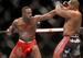 Jon Jones throws a left at Daniel Cormier.