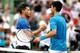 Dominic Thiem and Novak Djokovic shake hands after their match at the 2016 Miami Open.