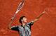 Dominic Thiem serves during his quarterfinals match at the 2016 French Open.
