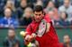 Novak Djokovic hits a backhand during the 2016 French Open.