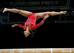 Laurie Hernandez spots the landing.