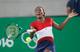 Venus Williams hits a forehand during a match at the 2016 Olympics.