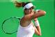 Garbine Muguruza hits a forehand during a match at the 2016 Olympics in Rio.