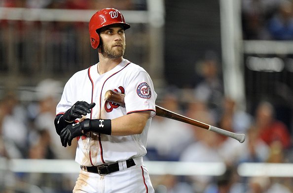 Bryce Harper fools everyone by pretending to get hit by foul ball