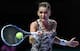 Agnieszka Radwanska hits a forehand during a match at the 2016 WTA Finals.