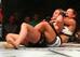 Tate, choking Holly Holm