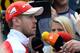 Sebastian Vettel faces the media at the 2016 German Grand Prix.