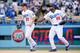 Dodgers OFs Joc Pederson (left) and Yasiel Puig