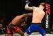 Marc Diakiese (left) hits Teemu Packalen.