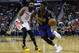 Jrue Holiday turns the corner on James Harden.