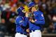Catcher Travis d'Arnaud and right-hander Noah Syndergaard.