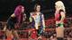 Sasha Banks and Bayley confront Alexa Bliss.