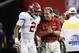 Jalen Hurts (2) and Nick Saban