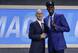 Magic draftee Jonathan Isaac (R) poses with NBA commissioner Adam Silver at the 2017 draft.