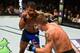Dennis Bermudez (left) faces Darren Elkins