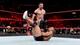 Finn Balor stomps on Jason Jordan's dreams as well as his stomach.