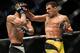 Rafael dos Anjos in action with Tony Ferguson.