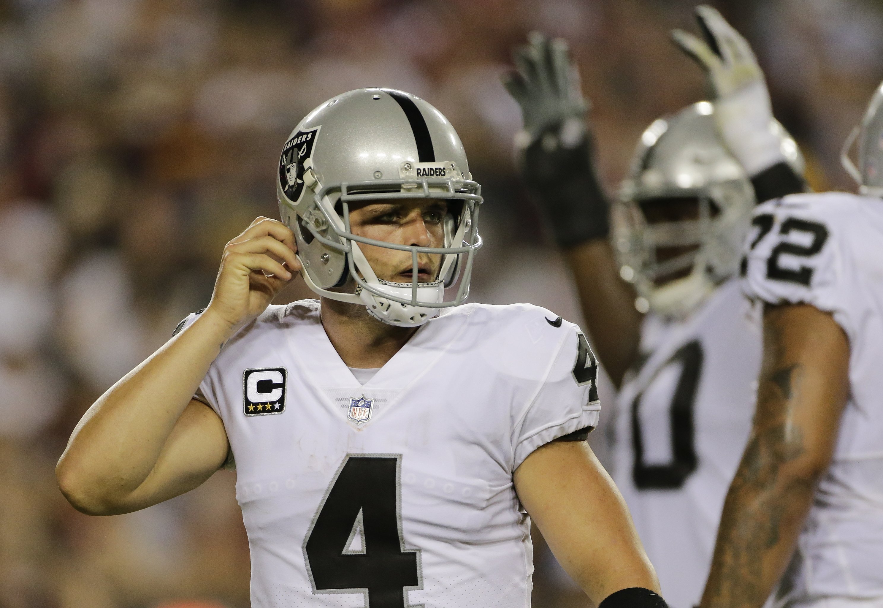 Derek Carr's TD pass caps Raiders' rally past Ravens 33-27 in OT