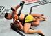 Jessica Andrade (top) punches Claudia Gadelha.