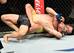 Ulka Sasaki attempts to defend a choke from Jussier Formiga.